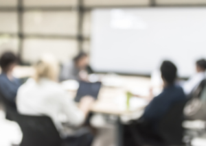 Blurred image of business meeting
