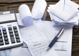 Pile of receipts and calculator