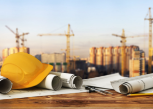 Construction blueprints and hardhat