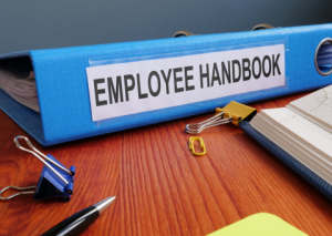 Employee handbook on desk